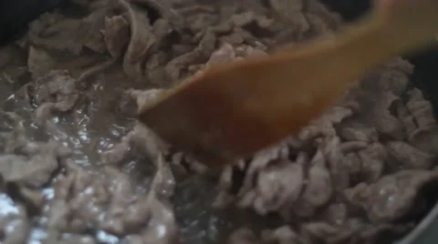 Meat stewed and fried in a pan Video stock 47471336