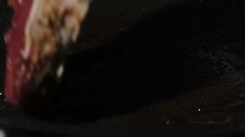 Meat streak on fire in slow motion Stock Footage 95220792