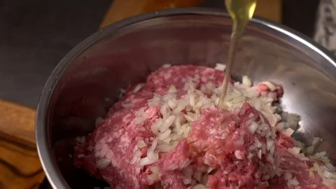 Meat stuffing for cutlets or meatballs in a stainless bowl. Stock Footage 107617780