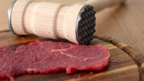 Meat Tenderizer and Raw Steak. Stock Footage 256224751