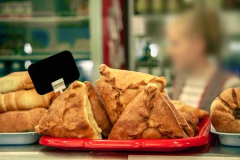 Meat triangular pie.Take it out of the oven.Hot dog.Vakbelyash.Bakery.National M 스톡 사진