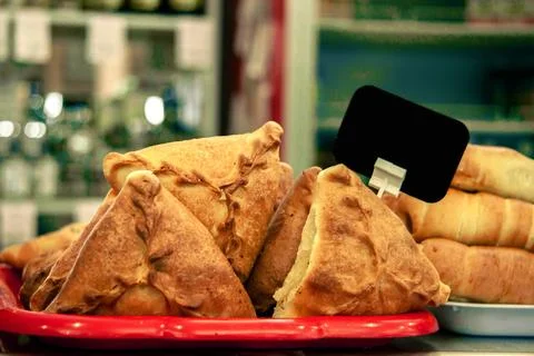 Meat triangular pie.Take it out of the oven.Hot dog.Vakbelyash.Bakery.National M 스톡 사진