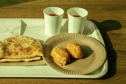 Meat triangular pie.Take it out of the oven.Hot dog.Vakbelyash.Bakery.National M 스톡 사진