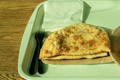 Meat triangular pie.Take it out of the oven.Hot dog.Vakbelyash.Bakery.National M 스톡 사진