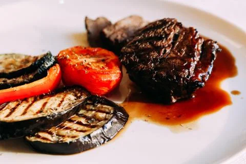 Meat with vegetables Stock Photos