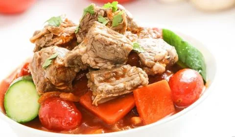 Meat with vegetables. Stock Photos