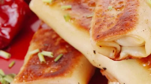 Meat wrapped in a pancake with red hot pepper 스톡 동영상 68855682