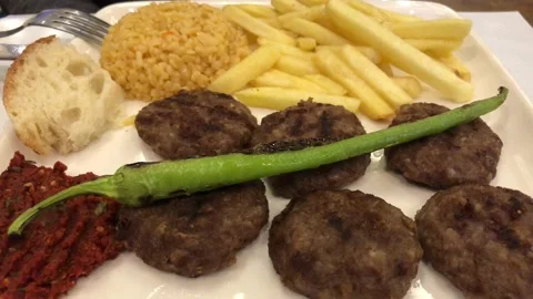 Meatball and fried potatoes. Stock Footage 100459352