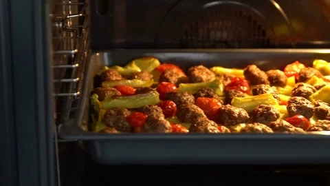 Meatball in the oven Stock Footage 77430383