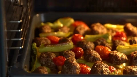 Meatball in the oven Stock Footage 77430385