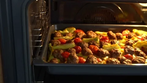 Meatball in the oven Stock Footage 77430386