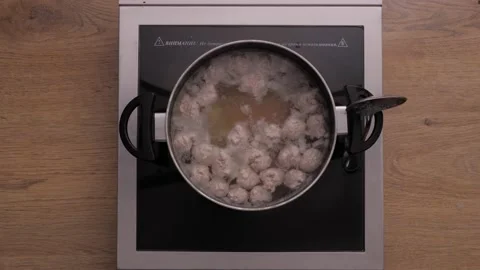 Meatball soup. cooking process. top view  Stock Footage 163970388