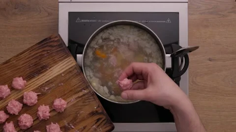 Meatball soup. cooking process. top view  Video stock 163970402