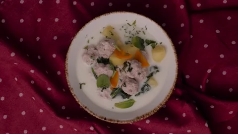 Meatball soup. Serving. Spinning. close-up  Video stock 163880200