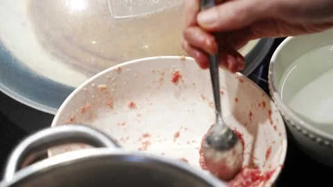 Meatballs are made from minced meat and dipped in boiling water.  Stock Footage 293479039