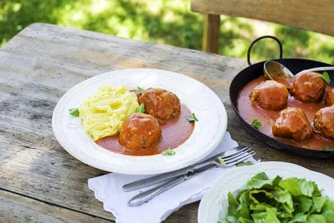 Meatballs braised in tomato sauce with mashed potatoes Stock Photos