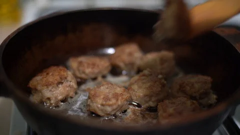 Meatballs fried in the pan. Stock Footage 127918887