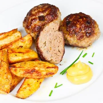 Meatballs with potatoes Stock Photos