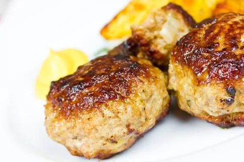 Meatballs with potatoes Stock Photos