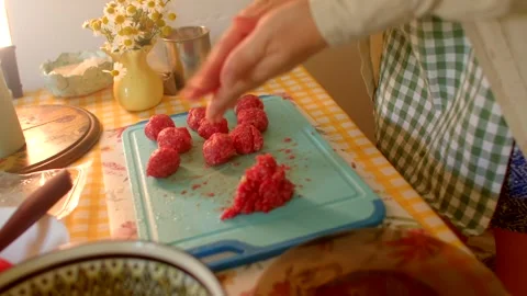 Meatballs in sunlight, rolling ground meat into perfect dinner balls Stock Footage 320956515
