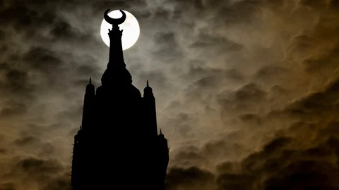 Mecca Clock Tower in Darkness, Time Lapse by Night with Full Moon, Saudi Arabia Stock Footage 113560652