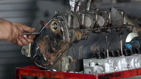 Mechanic Adjusting Car Engine Camshaft Valves Stock Footage 336932550