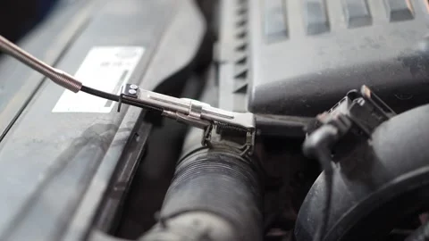 Mechanic Adjusting Engine Part with Wrench in Car Repair Shop Stock Footage 345709120