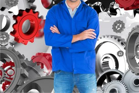 Mechanic against background with 3d cogs Stock Photos