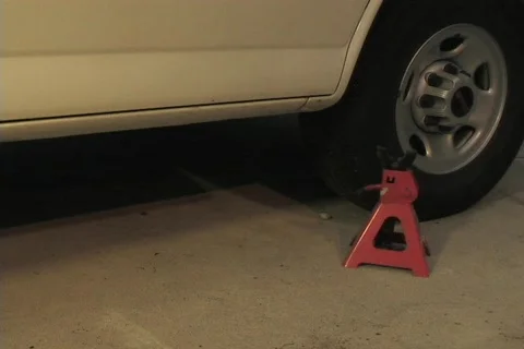 MECHANIC AND HIS JACK Stock Footage 137060