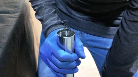 Mechanic Assembling Motorcycle Suspension Fork Parts Close-Up View Stock Footage 327324002