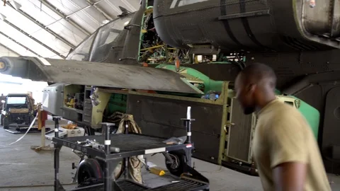 Mechanic Bay at Bagram co Stock Footage 124547894