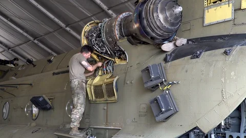 Mechanic Bay at Bagram co Stock Footage 124548764