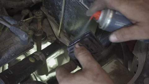 Mechanic changes the boot in the chassis of the car Stock Footage 126109592