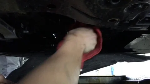 Mechanic Changing Oil Under Car 스톡 동영상 80268884