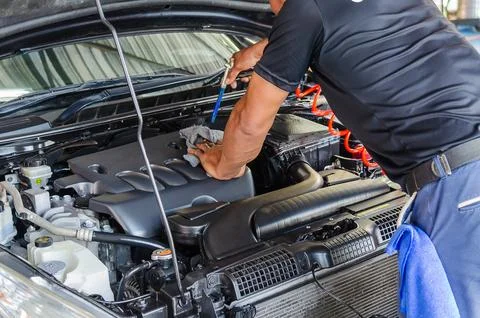 Mechanic check the engine Fotos Stock