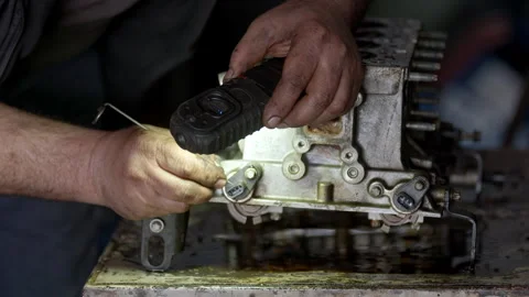 Mechanic Checking Car Engine Cylinder Head Stock Footage 336932288
