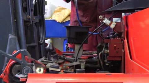 Mechanic cleaning engine Stock Footage 2281877