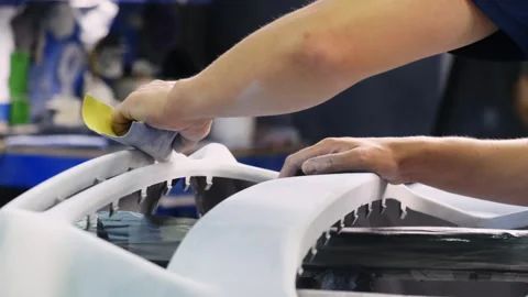 Mechanic cleans part preparing surface material for painting Stock Footage 317634916