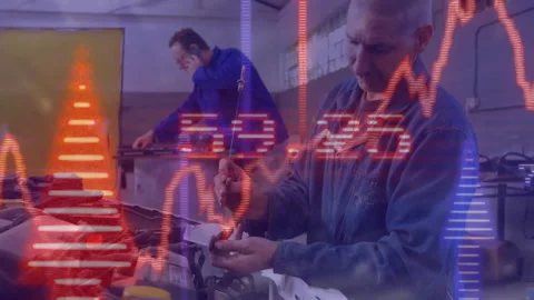 Mechanic comparing part with schematic driving animated graph during tightening Stock Footage 313494465