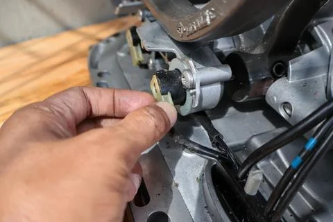 Mechanic Connecting Sensor Plug to Transmission Mechatronic Unit. Stock Photos