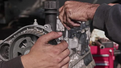 Mechanic Covers Valve of Car Engine with Socket Wrench in Repair Shop 3 Vídeos de archivo 221370322