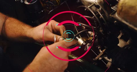 Mechanic detaching spark plug connector with scan overlay, routing harness Stock Footage 311584901