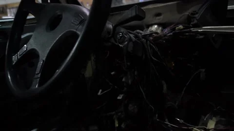 A mechanic disassembles an old dirty car Video stock 221433880