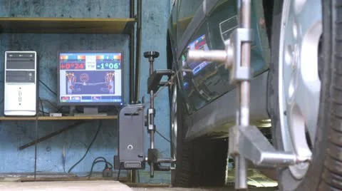 Mechanic does computer program test cycle of car, time lapse Stock-Footage 12046420