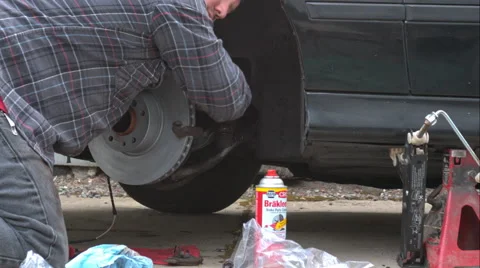 Mechanic Doing A Brake Job On An E39 Bmw 540I Video stock 49094065