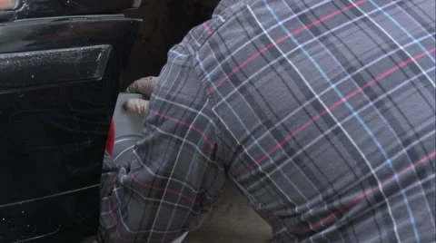 Mechanic Doing A Brake Job On An E39 Bmw 540I Stock Footage 49094202