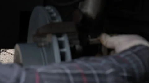Mechanic Doing A Brake Job On An E39 Bmw 540I Stock Footage 49094540