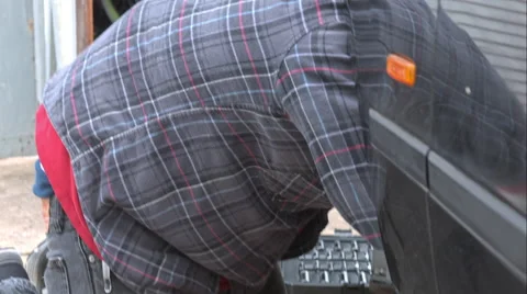 Mechanic Doing A Brake Job On An E39 Bmw 540I Video stock 49095279