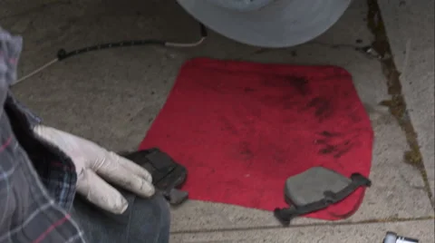 Mechanic Doing A Brake Job On An E39 Bmw 540I Stock Footage 49096049