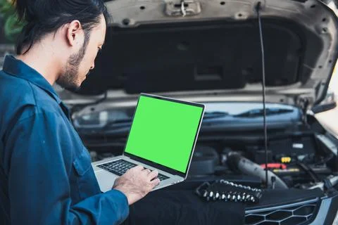 Mechanic Engineer is Diagnosing Car Engine and Electric Adjusting Transmissio Stock Photos